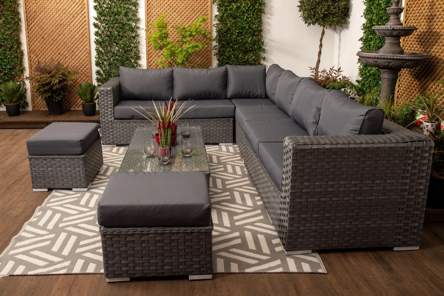 Marseille - Large Grey Rattan 9 Seater Corner Sofa Set With Glass Topped Coffee Table, Cushions & Stools - Image 4